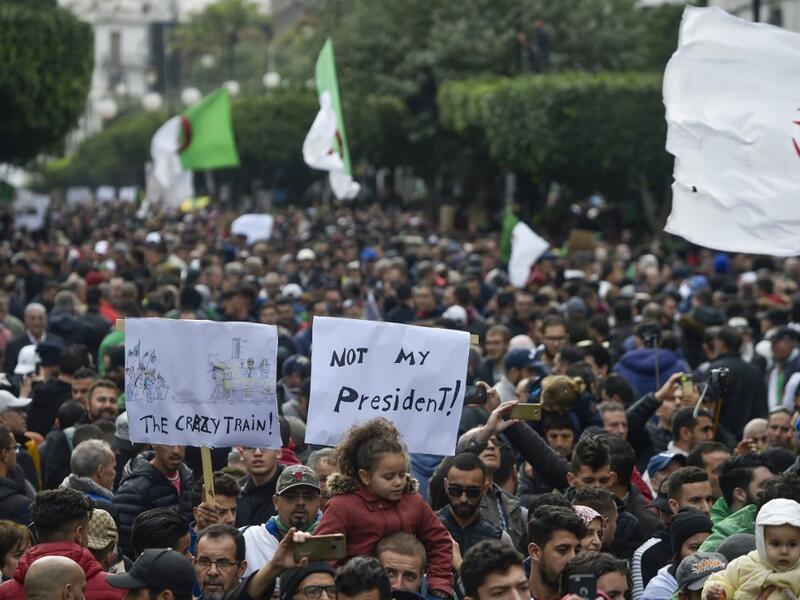 Algerian protesters take part in an anti-government demonstration in the capital Algiers on December 13, 2019 during the presidential election. (AFP/ File Photo) Algerian protesters take part in an anti-government demonstration in the capital Algiers on December 13, 2019 during the presidential election. (AFP/ File Photo)