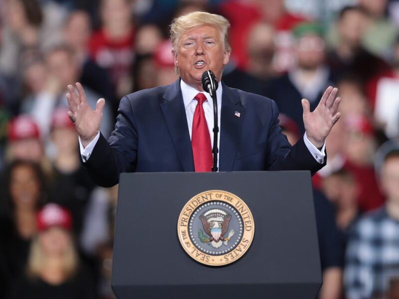 While Trump spoke at the rally the House of Representatives voted, mostly along party lines, to impeach the president for abuse of power and obstruction of Congress, making him just the third president in U.S. history to be impeached. Scott Olson/Getty Images/AFP