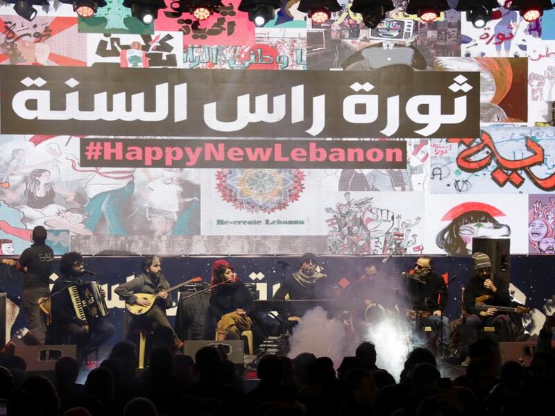 Lebanese band "The Great Departed" performs during new year's celebrations in downtown Beirut on December 31, 2019. ANWAR AMRO / AFP