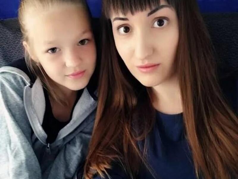 Maria Russkikh, 29, (pictured with her daughter) survived the fall and was found lying in the snow outside her flat in Novosibirsk, Siberia, moaning. (Daily MAil)