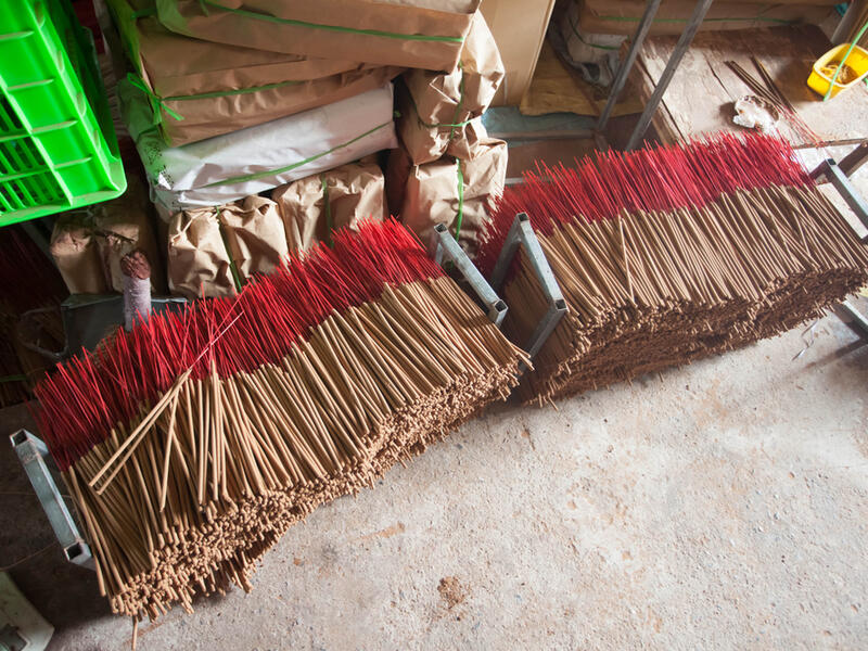 Vietnamese workers collect dried incense sticks in Quang Phu Cau village on the outskirts of Hanoi on January 9, 2020 ahead of the upcoming Lunar New Year celebrations, referred to in Vietnam as Tet (Shutterstock)