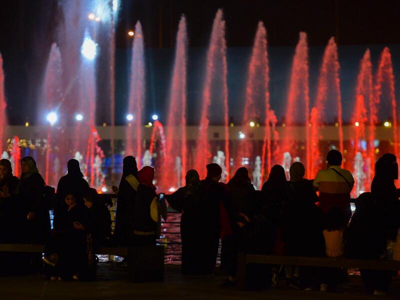 A picture taken on January 31, 2020 shows young Saudis gathering at the Riyadh Season Boulevard in the Saudi capital. In Saudi Arabia's rigid past, religious police once swooped down on rose sellers and anyone peddling red paraphernalia around Valentine's Day, but now a more open -- albeit risky -- dating culture is taking root. Pursuing relationships outside of marriage in the conservative Islamic kingdom once amounted to a death wish, and would-be Romeos resorted to pressing phone numbers up against their