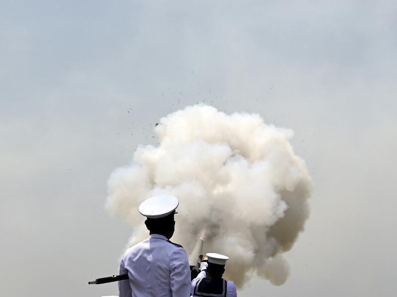 Sri Lankan Navy personnel fire a 21-gun salute to mark the island nation's 72nd Independence Day at the Galle Face promenade in Colombo on February 4, 2020. Sri Lanka cemmemorates its independence from British rule on February 4, 1948. LAKRUWAN WANNIARACHCHI / AFP