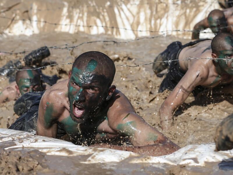 Palestinian police cadets take part in a training session at a police academy in Khan Yunis, in the southern Gaza Strip on February 6, 2020. MAHMUD HAMS / AFP