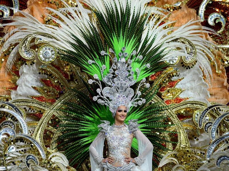 A participant presents her outfit during the Queen of the Carnival pageant contest in Santa Cruz de Tenerife, on the Spanish Canary island of Tenerife, on February 19, 2020. Gabriel BOUYS / AFP