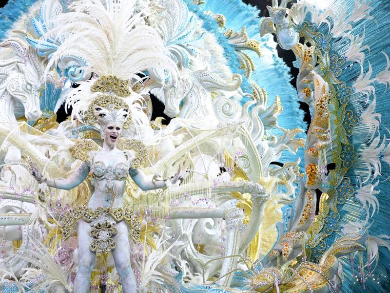 A participant presents her outfit during the Queen of the Carnival pageant contest in Santa Cruz de Tenerife, on the Spanish Canary island of Tenerife, on February 19, 2020. Gabriel BOUYS / AFP