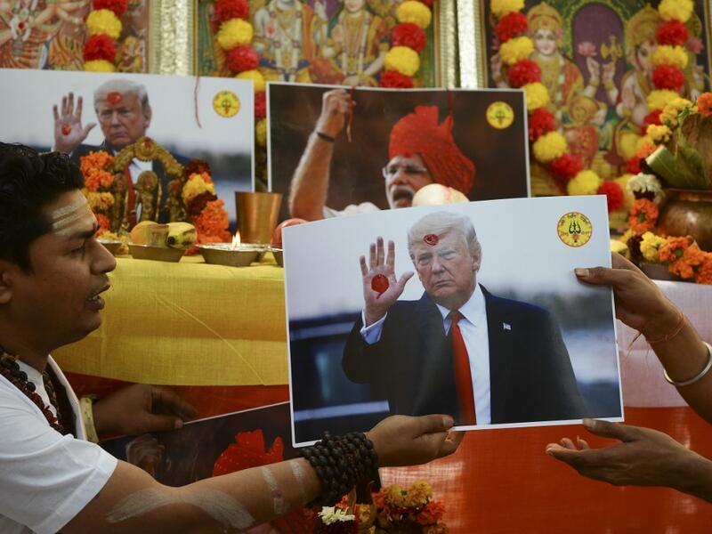 Hindu priests perform rituals during prayers organised by Hindu Sena, a far-right Hindu group, seeking blessings from gods and to unite India and the United States of America against radical Islamic fanatics, in New Delhi on February 24, 2020, on the occasion of US President Donald Trump first official visit to India. Sajjad HUSSAIN / AFP