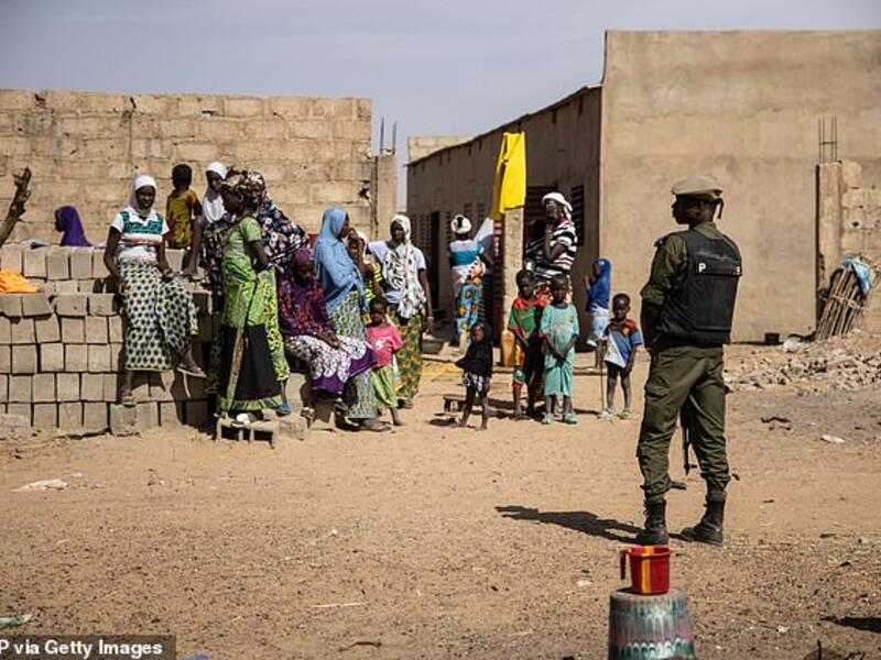 A Burkina Faso soldier patrols at a district that welcomes Internally Displaced People (IDP) from northern Burkina Faso, in Dori on February 3, 2020. (AFP)