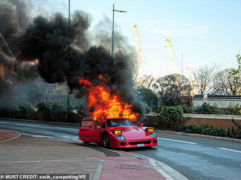The Italian sportscar sent plumes of black smoke into the sky after the back of the vehicle ignited on a street in Monte Carlo, Monaco. (Daily Mail)