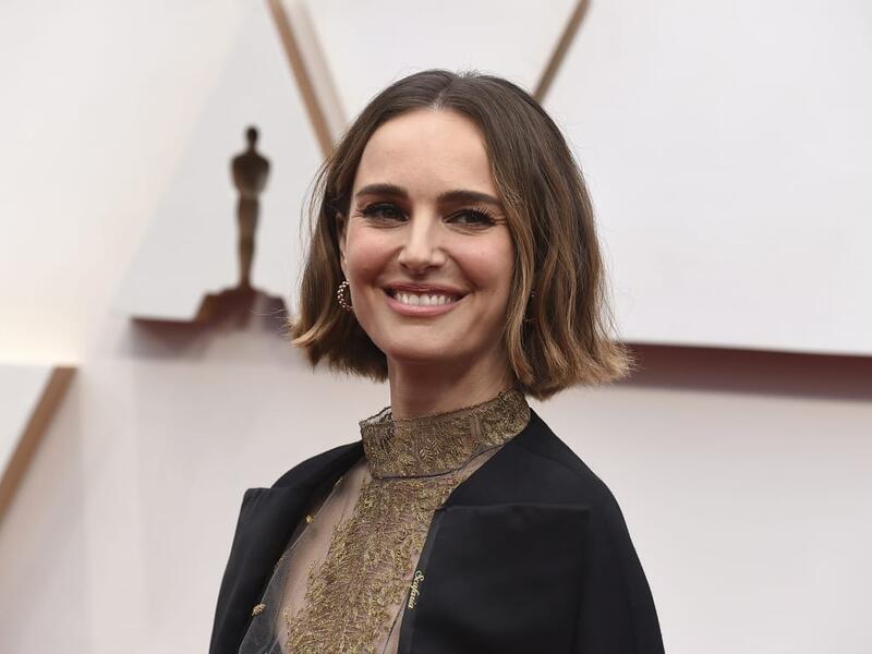 Natalie Portman's cape embroidered with names of women in the industry, "who were not represented for their incredible work this year."