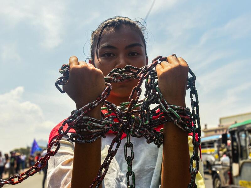 Filipino women hold a protest rally during the celebration of International Women's Day in Manila on March 8 2020. Maria TAN / AFP