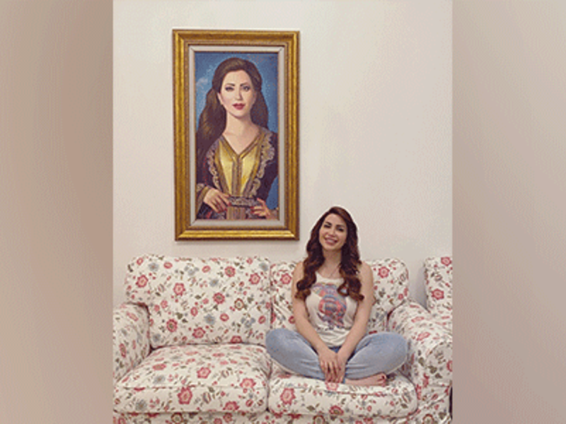 Nesreen Tafesh posing at home