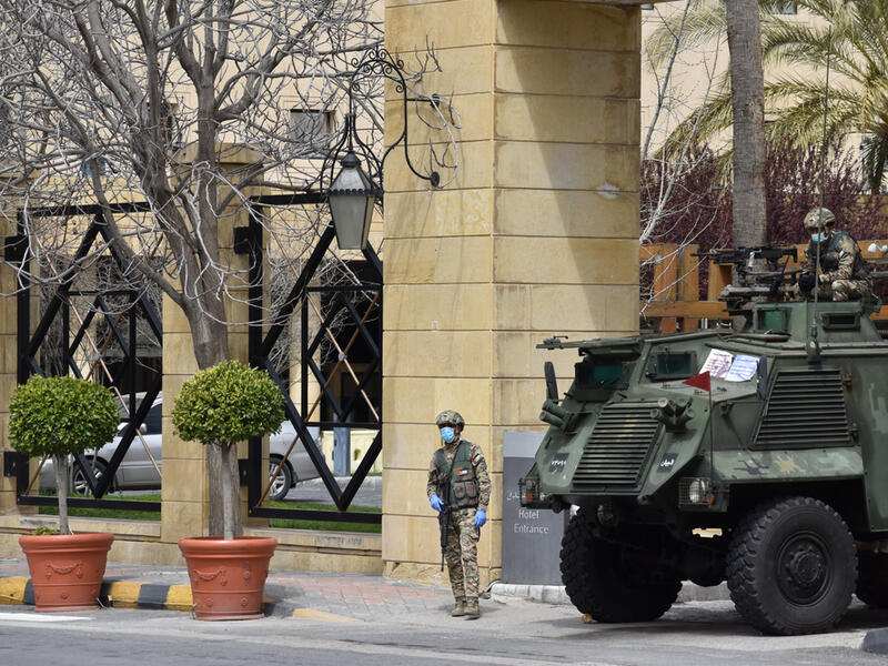 Soldiers outside a hotel in Amman, Jordan. The country is currently under strict curfew enforced by the military to combat coronavirus. (Shutterstock/ File Photo)