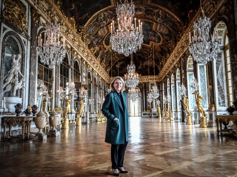 President of the Palace of Versailles (Chateau de Versailles) Catherine Pegard poses at the Galerie des Glaces (Hall of Mirrors) at the Chateau de Versailles (Palace of Versailles) in Versailles near Paris, on June 5, 2020, on the eve of it re-opening after 82 days of closure due to the novel coronavirus (COVID-19) outbreak. The Palace of Versailles -- France's big tourist attraction with nearly 10 million tourists a year - will open on June 6 with no US or Asia tourists who represent 30% of its visitors. S