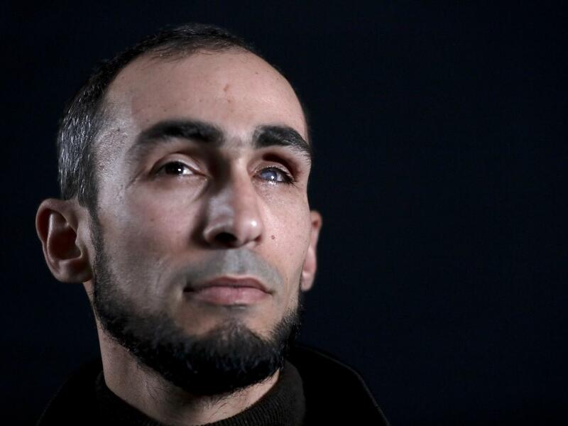 Ahmed al-Louth, who lost his left eye in the ongoing conflict with Israel, poses during a photo session in Bureij refugee camp in central Gaza, on February 4 , 2020. Along the border of the Gaza Strip, the Israeli army uses snipers who, according to instructions, open fire only when the soldiers are at risk from intensifying violence from Palestinian rioters. Some were taking part in clashes, others simply in the wrong place at the wrong time. All were left scarred and their lives wrecked, even though in Pa