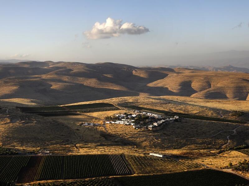 A picture shows the Israeli settlement of Mitzpe Kramim, on June 18, 2020 in the occupied West Bank. The government of Israeli Prime Minister Benjamin Netanyahu has said it could begin the process to annex Jewish settlements in the West Bank as well as the strategic Jordan Valley from July 1. The plan -- endorsed by Washington -- would see the creation of a Palestinian state, but on reduced territory, and without Palestinians' core demand of a capital in east Jerusalem. MENAHEM KAHANA / AFP