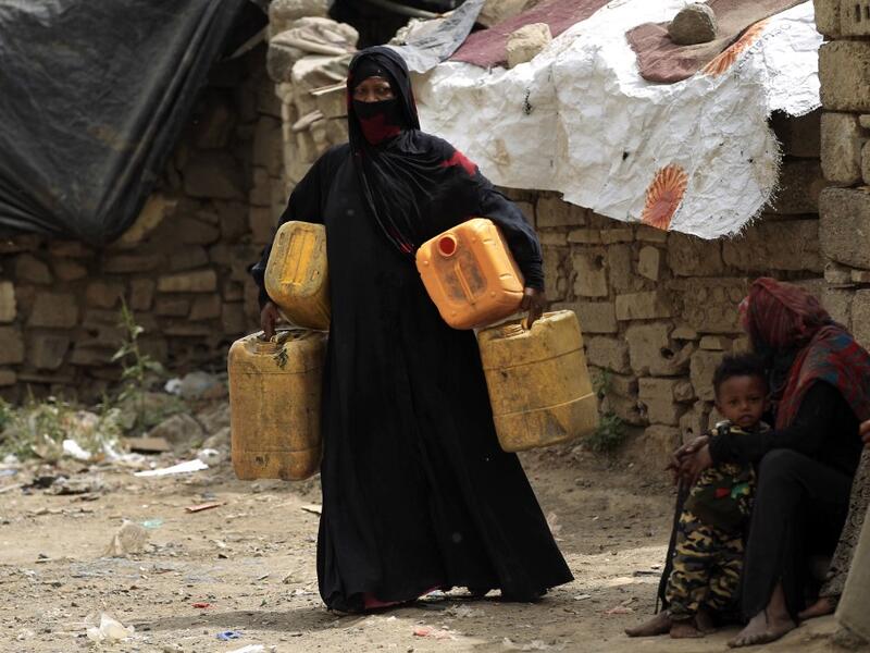 Members of Yemen's minority group known as "Muhamasheen" -- literally the "Marginalised" are pictured at a slum in the capital Sanaa on July 4, 2020. At a time when the Black Lives Matter movement is reshaping societies, black Yemenis have scant hope for an end to centuries of discrimination that has only worsened during the civil war. In Sanaa, members of the minority group known as "Muhamasheen" live in dismal conditions in densely populated slums. They count among the poorest of the poor in the Arab worl