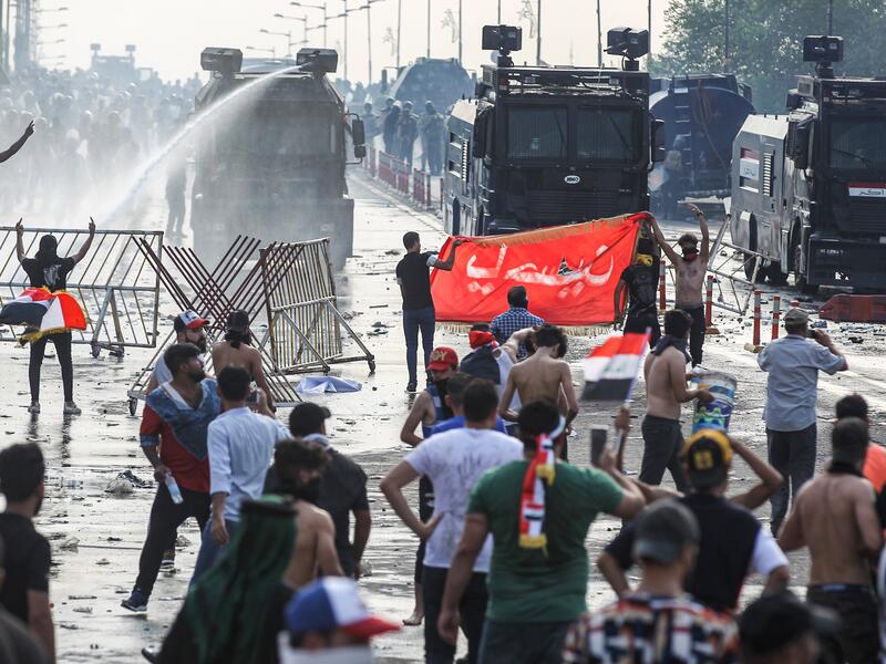 Security forces have used water cannons and tear gas to disperse more than 1,000 protesters in central Baghdad. Iraq is considered the 12th most corrupt country in the world according to Transparency International. Power cuts are rampant, water shortages are common and unemployment is high, particularly among youth. (Ahmad Al-Rubaye/ AFP)