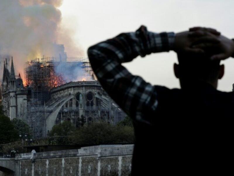 Macron wants Notre-Dame restored to its former glory by 2024, in time for the Paris Olympics. (AFP/File Photo)