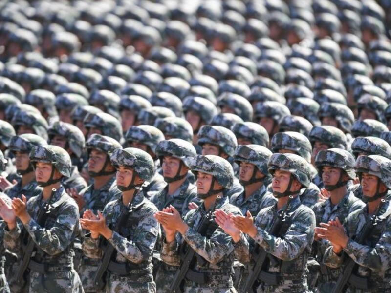 The first white paper since 2012 gives rare insight into the world's largest army and Beijing's military ambitions (AFP Photo/STR)