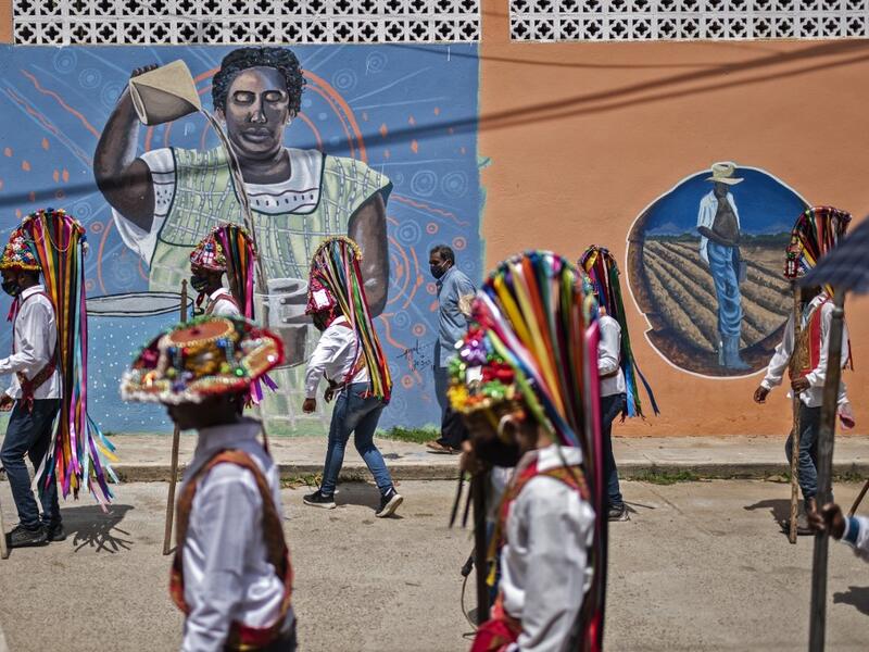 Members of the Afro-Mexican community take part in the annual festival dedicated to San Nicolas Tolentino, in Cuajinicuilapa, Guerrero state, Mexico, on September 10, 2020, amid the COVID-19 coronavirus pandemic. Although there are 1,5 million African descendants in a country of 128 million inhabitants, it is normal to hear that "in Mexico there are no blacks". PEDRO PARDO / AFP