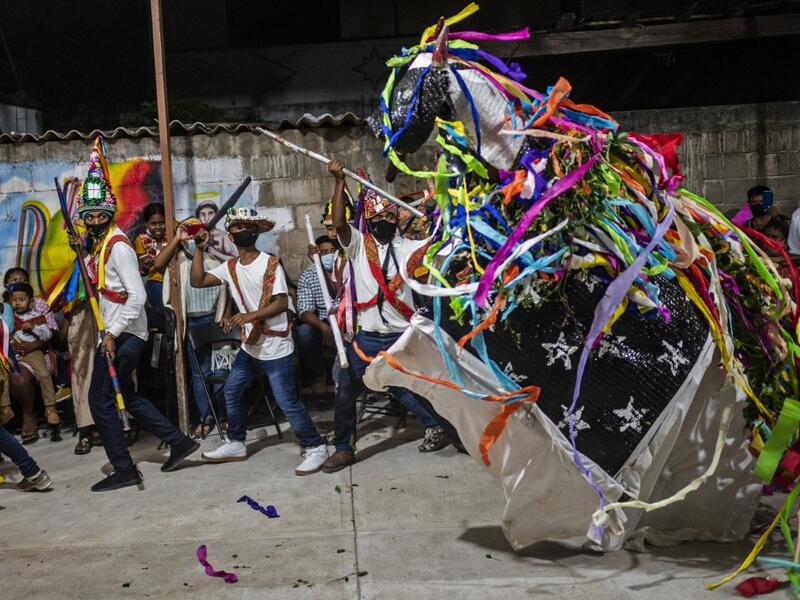 Members of the Afro-Mexican community perform the Toro de Petate dance in the annual festival dedicated to San Nicolas Tolentino, in Cuajinicuilapa, Guerrero state, Mexico, on September 9, 2020, amid the COVID-19 coronavirus pandemic. Although there are 1,5 million African descendants in a country of 128 million inhabitants, it is normal to hear that "in Mexico there are no blacks". PEDRO PARDO / AFP