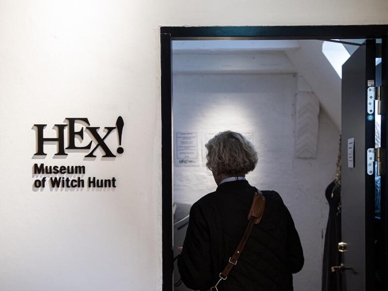 People visit the HEX!, a museum of Witch Hunt, on October 1, 2020 in Ribe, Denmark. Located in the home of a former witch hunter, the Hex! Museum of Witch Hunt sheds light on how a fear of witches led to persecutions that swept across Denmark and Europe in the 16th and 17th centuries. Jonathan NACKSTRAND / AFP