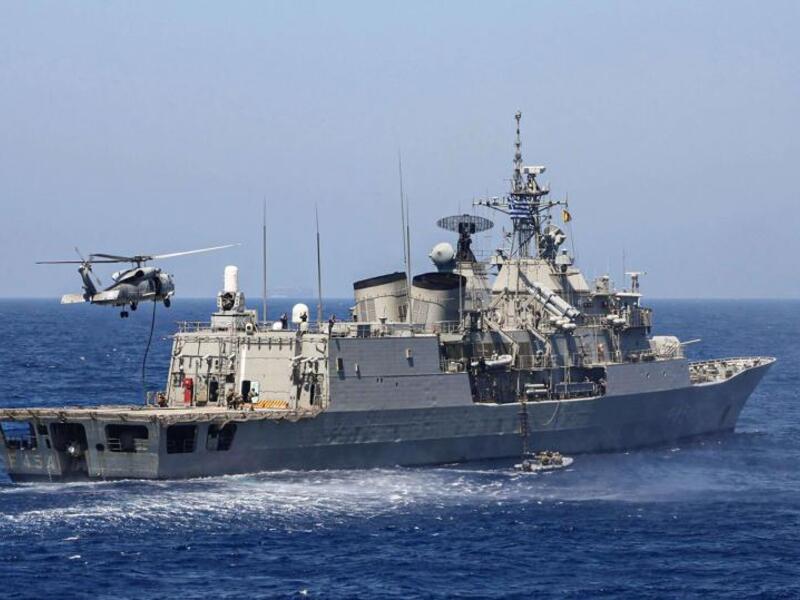 Greek Hydra-class frigate Psara (F-454) of the Hellenic Navy and a military helicopter taking part in a military exercise in the eastern Mediterranean Sea, on August 25. (AFP)