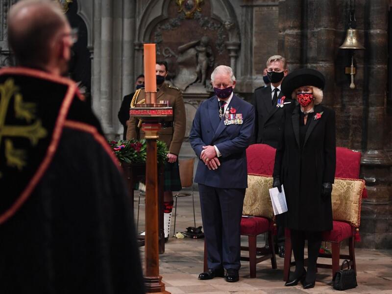 Britain's Prince Charles, Prince of Wales and Britain's Camilla, Duchess of Cornwall participate in a service to commemorate the centenary of the burial of the Unknown warrior at Westminster Abbey on Armistice day in London on November 11, 2020. Jeremy Selwyn / POOL / AFP
