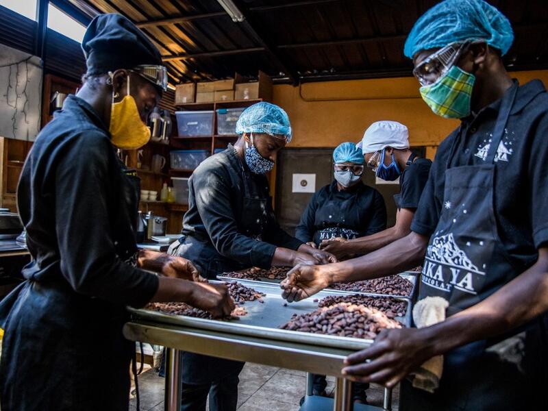 Sorting of cocoa beans according to their size and appearance is done in the workshops of Makaya Chocolat on December 23, 2020 in Petionville, Haiti. Although small in the face of South America's giants, Haiti is slowly developing its cocoa industry to ensure better incomes for thousands of modest farmers and to end the stereotype of gastronomic art known as the domain of wealthy countries. Valerie Baeriswyl / AFP