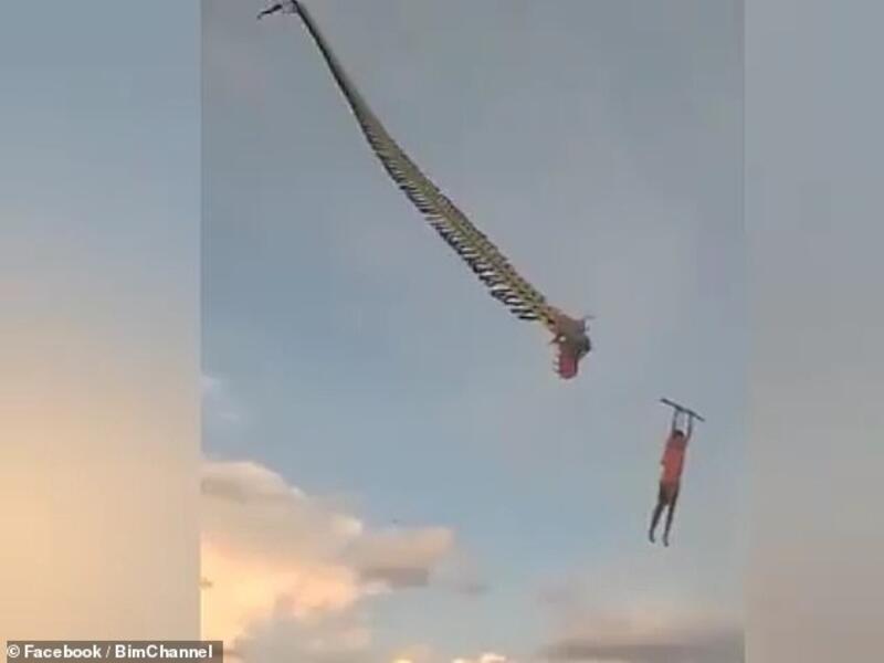 The boy began to fall when the dragon's head became detached from the body of the kite. A similar incident occurred in September when a 14-year-old boy fell after being lifted off the ground by a kite. (Facebook/ Video Screenshot)
