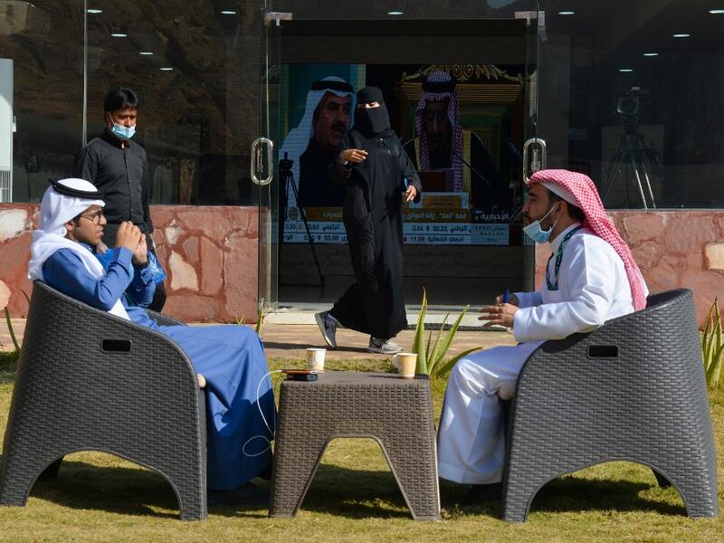 Journalists are pictured at the media centre ahead of the 41st Gulf Cooperation Council (GCC) summit in the city of Al-Ula in northwestern Saudi Arabia on January 5, 2021.FAYEZ NURELDINE / AFP