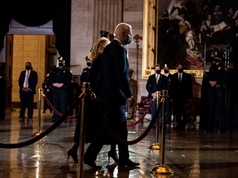 President Joe Biden and First Lady Jill Biden depart after paying their respects to the late Capitol Police Officer Brian Sicknick who lies in honor in the Rotunda of the Capitol in Washington, DC on February 2, 2021. AFP
