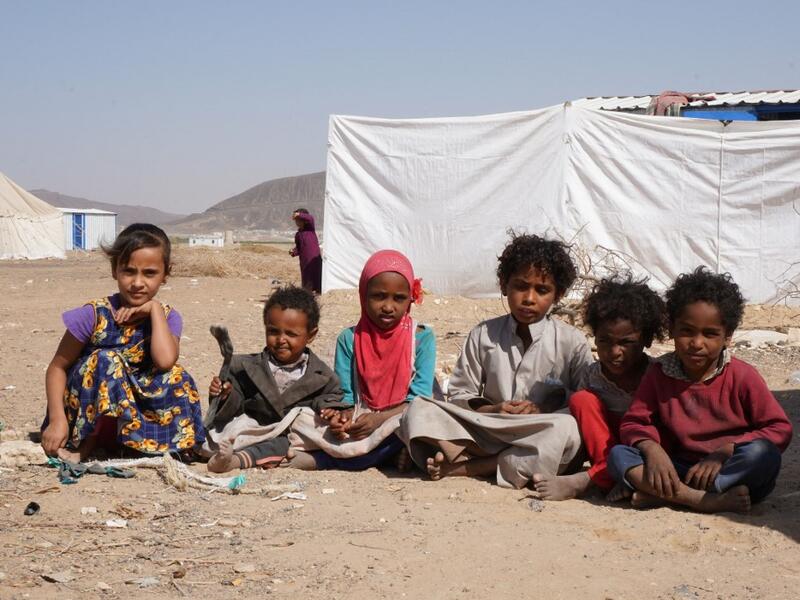 Yemeni children sit at the Jaw al-Naseem camp for internally displaced people on the outskirts of the northern city of Marib, on February 18, 2021 in the Saudi-backed Yemeni government's last northern bastion. Until early last year, life in Marib city was relatively peaceful despite the Yemen's civil war that erupted in 2014. The United Nations warned last week of a potential humanitarian disaster if the fight for Marib continues, saying it has put "millions of civilians at risk". More than 3.3 million have