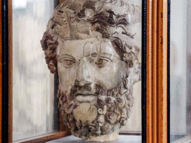  view of a Greek sculpture of the head of Zeus on display at the Cyrene Museum which houses Greco-Roman artefacts, in the eastern Libyan town of Shahat