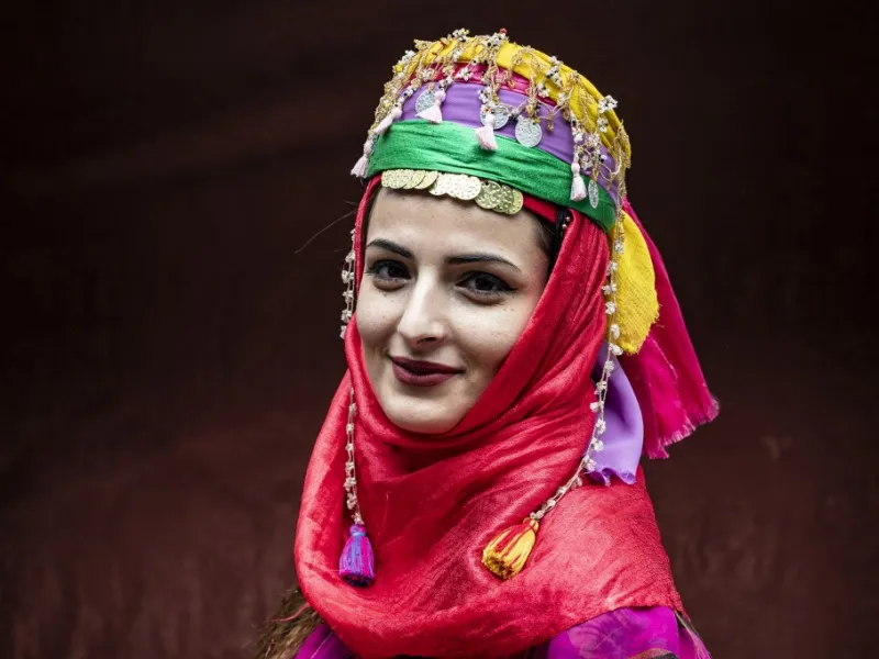 A Syrian Kurdish woman in traditional attire