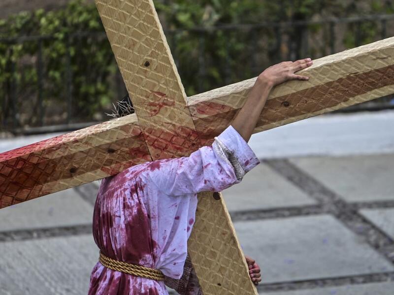 An actor reenacts the Passion of the Christ in Iztapalapa neighbourhood in eastern Mexico City on April 2, 2021, as the Holy Week Good Friday 