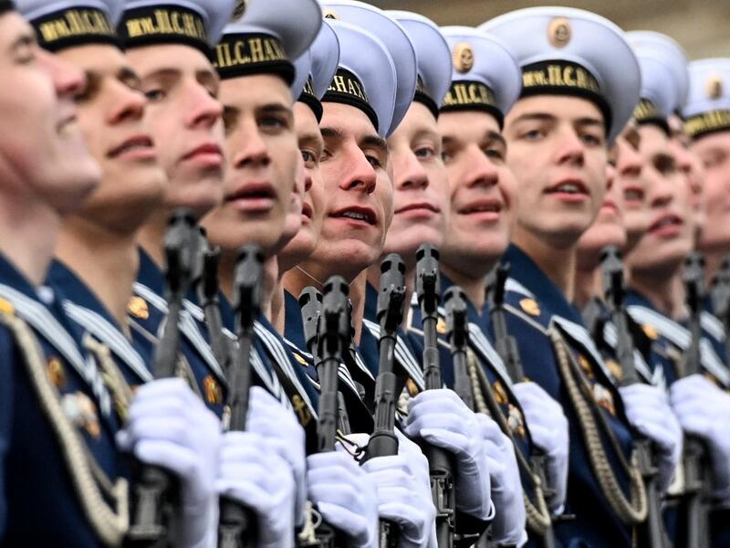 Russian sailors march along Red Square during the Victory Day military parade in Moscow on May 9, 2021. Russia celebrates the 76th anniversary of the victory over Nazi Germany during World War II. Russia celebrates the 76th anniversary of the victory over Nazi Germany during World War II