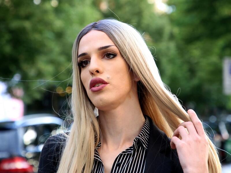 Albanian transgender Denisa, speaks during an interview in a street of Tirana’s city center on May 20, 2021. For the first time, four transgender women decided to participate in an Exhibition "Being Transgender in Albania" to fight the stigma and increase awareness on trans issues.After years of isolation, she and others in the transgender community decided to confront taboos in the open for the first time