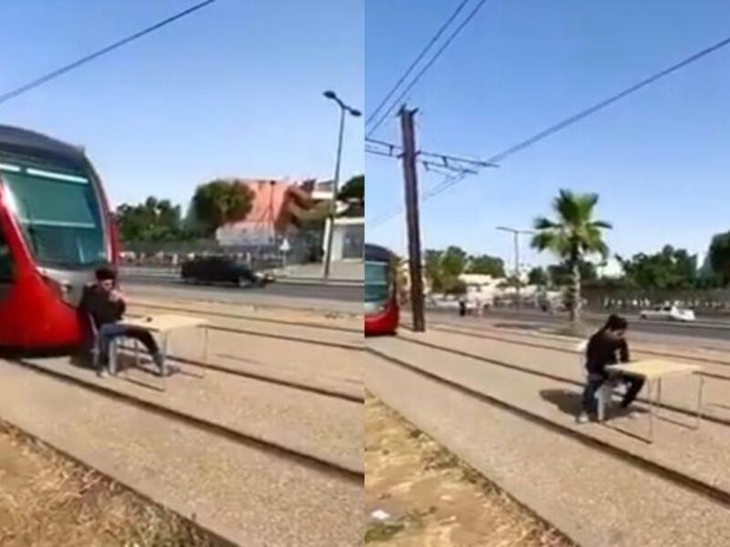 مستهتر يقطع طريق القطار لشرب القهوة 