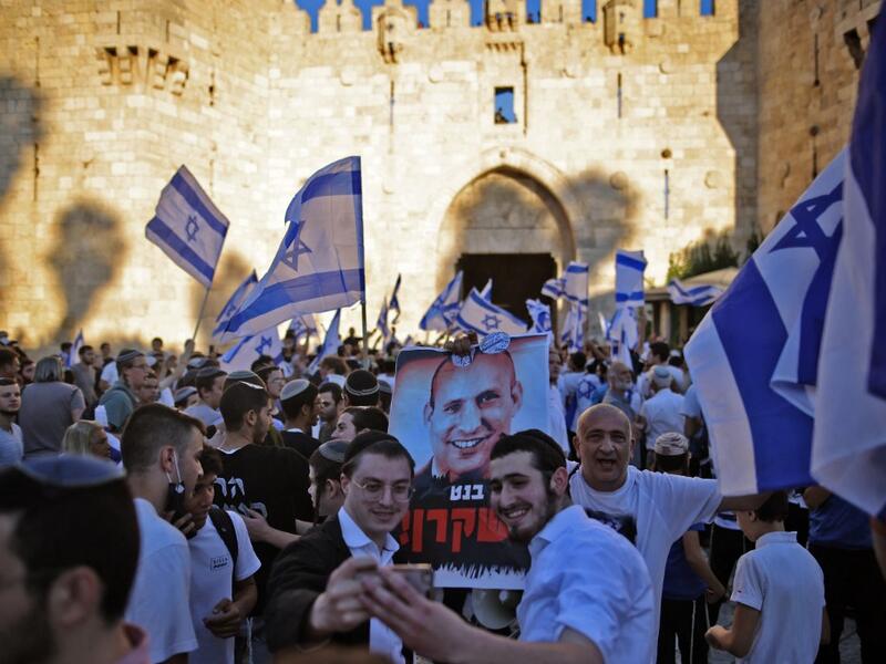Several Palestinians injured amid clashes during controversial flag march in Jerusalem