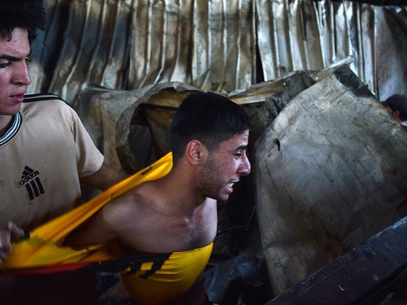 Iraqis Mourn Victims in Covid-19 Facility Hospital Fire