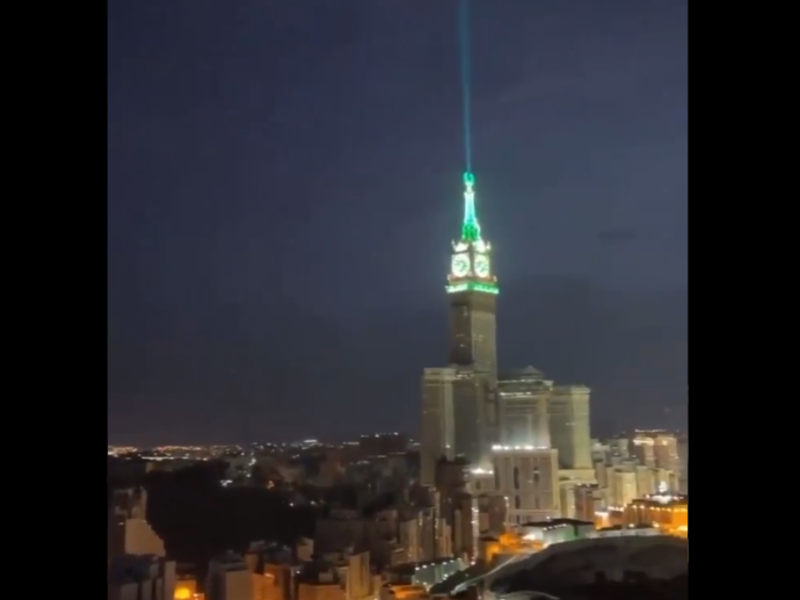 Makkah Royal Clock Tower in Saudi Arabia beaming light into the sky