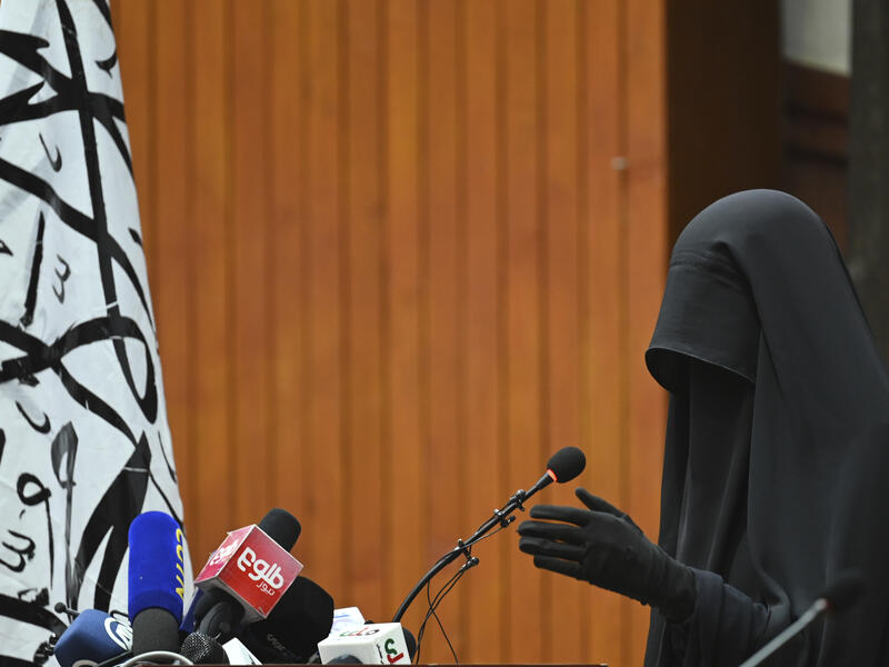 women participating in anti-Taliban protests are “not true representations of Afghan women.
