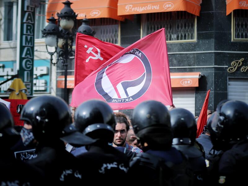 Thousands gather in Tunis in largest protest for years.