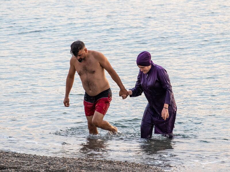 lawmakers in Grenoble, France, voted to allow Muslim women to wear burqini swimsuits at state-run swimming pools