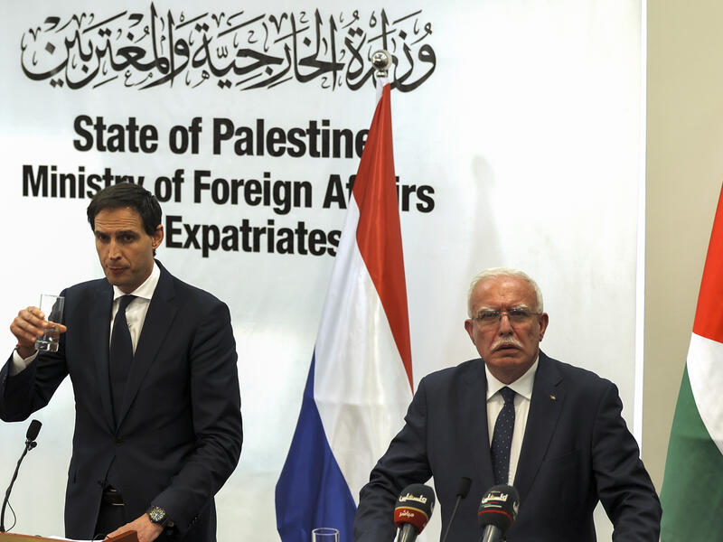 Wopke Hoekstra (L) Riyad al Malki (R)