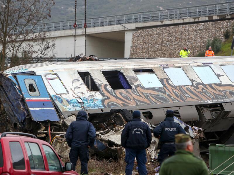 German train runs over employees, kills 2