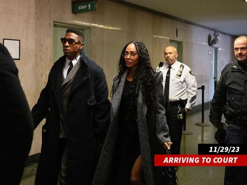 Jonathan Majors and Meagan Good at New York court during his assault trial. (Associated Press)