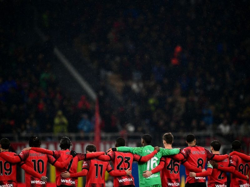 فريق ميلان (Photo by Marco BERTORELLO / AFP)